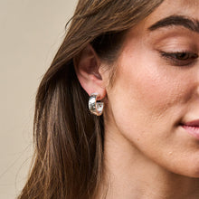 Load image into Gallery viewer, close up of a person wearing a Capucine de Wulf Jewelry Cleopatra Classic Hoop Earrings in silver