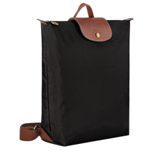 Load image into Gallery viewer, Longchamp Le Pliage Original Backpack in black with brown leather trimming side view to show width