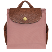 Load image into Gallery viewer, Longchamp Le Pliage Original Backpack - Medium in Pink Tea folded and snapped closed for travel