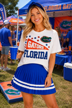 Load image into Gallery viewer, woman in white t-shirt with a Florida Gators Pennant, stars and the gator head logo