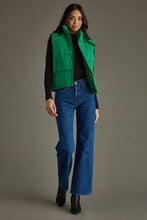 Load image into Gallery viewer, woman in a puffy Classic Green Vest paired with a black shirt and jeans with the vest open