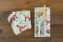 Load image into Gallery viewer, Hester & Cook Fanciful Fox Paper Napkins cocktail and guest towel size on a table with flatware