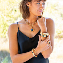 Load image into Gallery viewer, person wearing gold and Labradorite jewelry