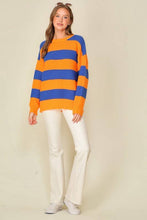 Load image into Gallery viewer, woman in orange and blue horizontal striped sweater paired with white pants