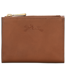 Load image into Gallery viewer, brown wallet with blue zipper along the top and the Longchamp logo in the leather