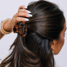Load image into Gallery viewer, person using the TELETIES Open Tortoise Petite Hair Clip