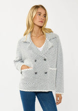 Load image into Gallery viewer, person wearing Black & WhiteChevron Stripe Button-Up Sweater Jacket showing pocket