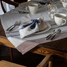 Load image into Gallery viewer, Table setting with Danish Stripe linen and mystic knot place settings and napkin holders