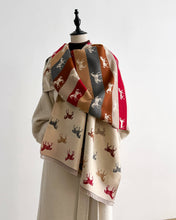 Load image into Gallery viewer, Tri Tone Equine Reversible Wrap - Red & Brown showing stripes on one side and cream on the other with colorful horses