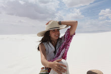 Load image into Gallery viewer, woman wearing the tan hat with wide brim