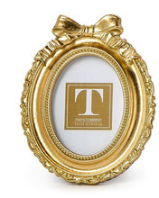 Load image into Gallery viewer, Gold oval frame with a bow on top