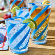 Load image into Gallery viewer, short glass with blue diagonal stripes holding soda and lime