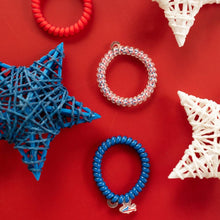Load image into Gallery viewer, TELETIES Sea to Shining Sea 3 Pack Hair Ties one blue one red and one red white and blue on a red background