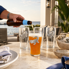 Load image into Gallery viewer, beer being poured into a Alligator Beer Pint Glass
