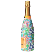 Load image into Gallery viewer, Champagne Bottle covered with the Happy Birthday Floral Bottle wrap text reads happy birthday Champagne cheers brut side view