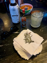 Load image into Gallery viewer, Second Line Beverage Napkins being used at a bar