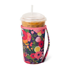 Load image into Gallery viewer, Swig Secret Garden Iced Cup Coolie showing handle and holding an iced coffee cup