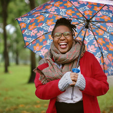 Load image into Gallery viewer, person holding an open umbrella
