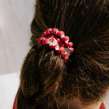 Load image into Gallery viewer, person with a red TELETIES Spiral Hair Coils Large Go Noles! Hair Ties