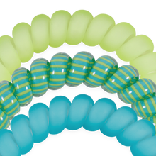 Load image into Gallery viewer, close up of three TELETIES Cabana Cutie Hair Ties one light blue, green and teal stripes, and blue