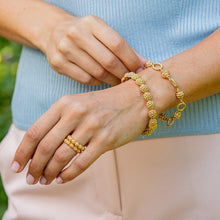 Load image into Gallery viewer, person wearing gold bracelets and rings
