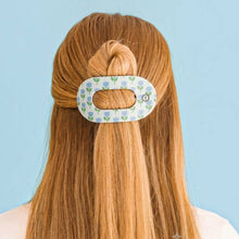 Load image into Gallery viewer, person wearing TELETIES Blue Marigold Medium Flat Round Hair Clip to hold part of her hair