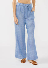 Load image into Gallery viewer, person wearing the Striped Wide Leg Pant with Side Pockets with a hand in the side pocket