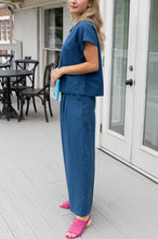 Load image into Gallery viewer, woman in the Hayley Linen Pants in blue paired with a matching top