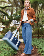 Load image into Gallery viewer, Person wearing Spartina 449 Rory Wide Leg Jean May River Wash