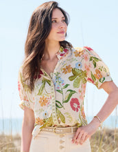 Load image into Gallery viewer, person wearing Jazmine Blouse Lightner Garden - cream short sleeve blouse with floral print