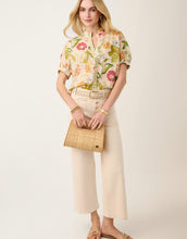 Load image into Gallery viewer, person wearing a Jazmine Blouse Lightner Garden paired with cream colored pants