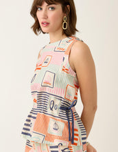 Load image into Gallery viewer, person wearing the Spartina 449 Nadia Sleeveless Blouse Admiral pattern. side view showing gathered tie at the waist