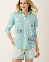 Load image into Gallery viewer, woman in blue button but 3/4 sleeves embroidered with boats