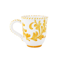 Load image into Gallery viewer, Vietri Arezzo Yellow Mug showing painted leaves design