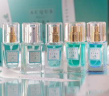 Load image into Gallery viewer, perfume bottles with Acqua dell'Elba label