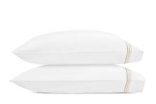 Load image into Gallery viewer, Two pillows with Amara Triple Pearl pillowcases with three lines of embroidery in three beach shades