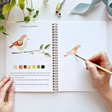 Load image into Gallery viewer, person painting a bird in the Animals Watercolor Workbook