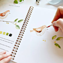 Load image into Gallery viewer, person painting a bird in the Animals Watercolor Workbook