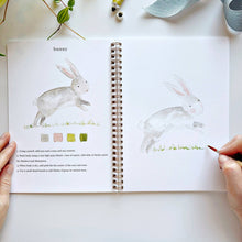 Load image into Gallery viewer, person painting a rabbit in the Animals Watercolor Workbook