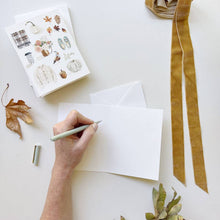 Load image into Gallery viewer, person writing in a blank card