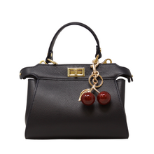 Load image into Gallery viewer, Cherry Bag Charm on a bag