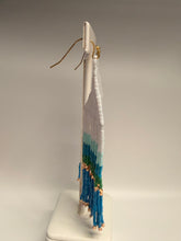 Load image into Gallery viewer, Decorative feather with blue and green tips on a white background