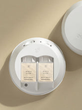 Load image into Gallery viewer, two Beach Glow Becki Owens Pura Smart Vial Diffuser Refill in diffuser