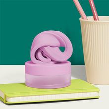 Load image into Gallery viewer, Speks Blur Calming Focus Putty in pink sitting on a desk