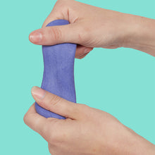 Load image into Gallery viewer, hands holding purple Speks Blur Calming Focus Putty