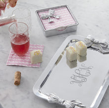 Load image into Gallery viewer, silver tray with accent bow shaped handles engraved with a monogram and set with sweets