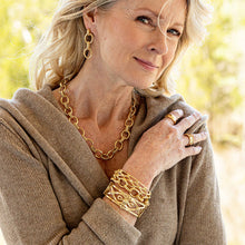 Load image into Gallery viewer, woman wearing gold jewelry