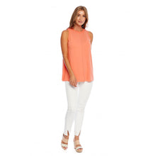 Load image into Gallery viewer, woman in an orange sleeveless shirt and white pants