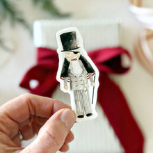 Load image into Gallery viewer, person holding the watercolor style Drosselmeyer Sticker