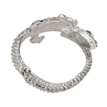 Load image into Gallery viewer, Crocodile/Alligator shaped bracelet with many clear stones showing underside on bracelet and hinge on the tail